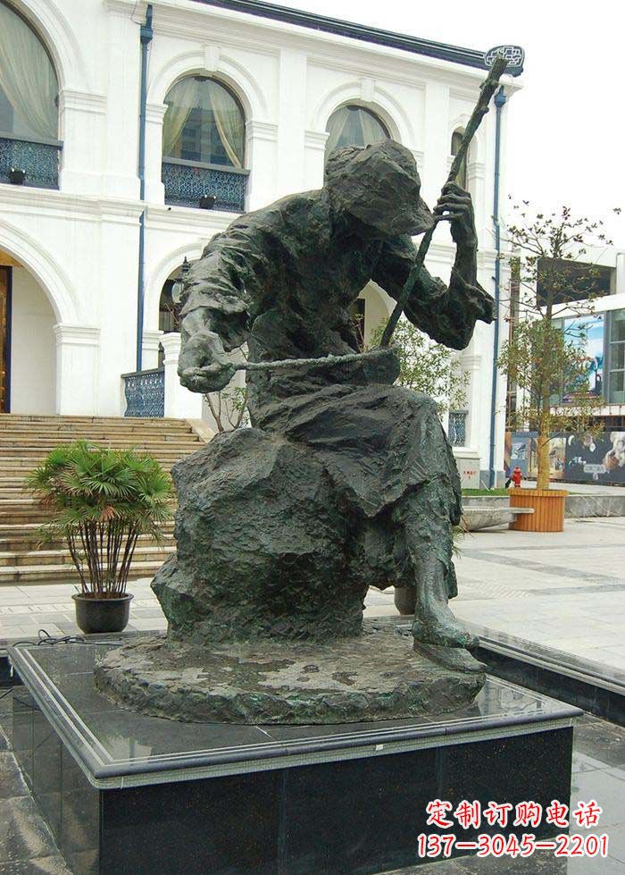 金华步行街拉二胡的人物景观铜雕