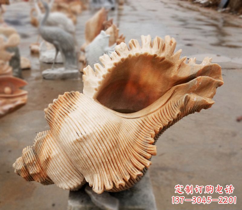 金华晚霞红海螺石雕广场景观雕塑