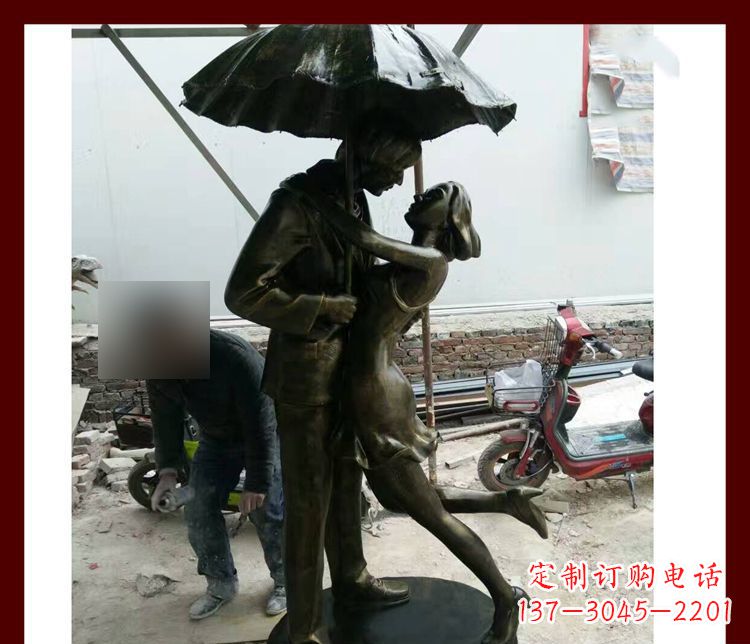 金华雨伞下拥抱的情侣铜雕