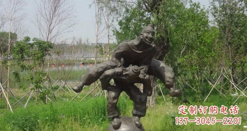 金华园林站在球上面跳山羊的人物景观铜雕