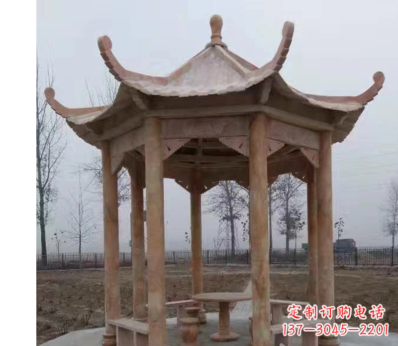 金华公园晚霞红八角石雕凉亭