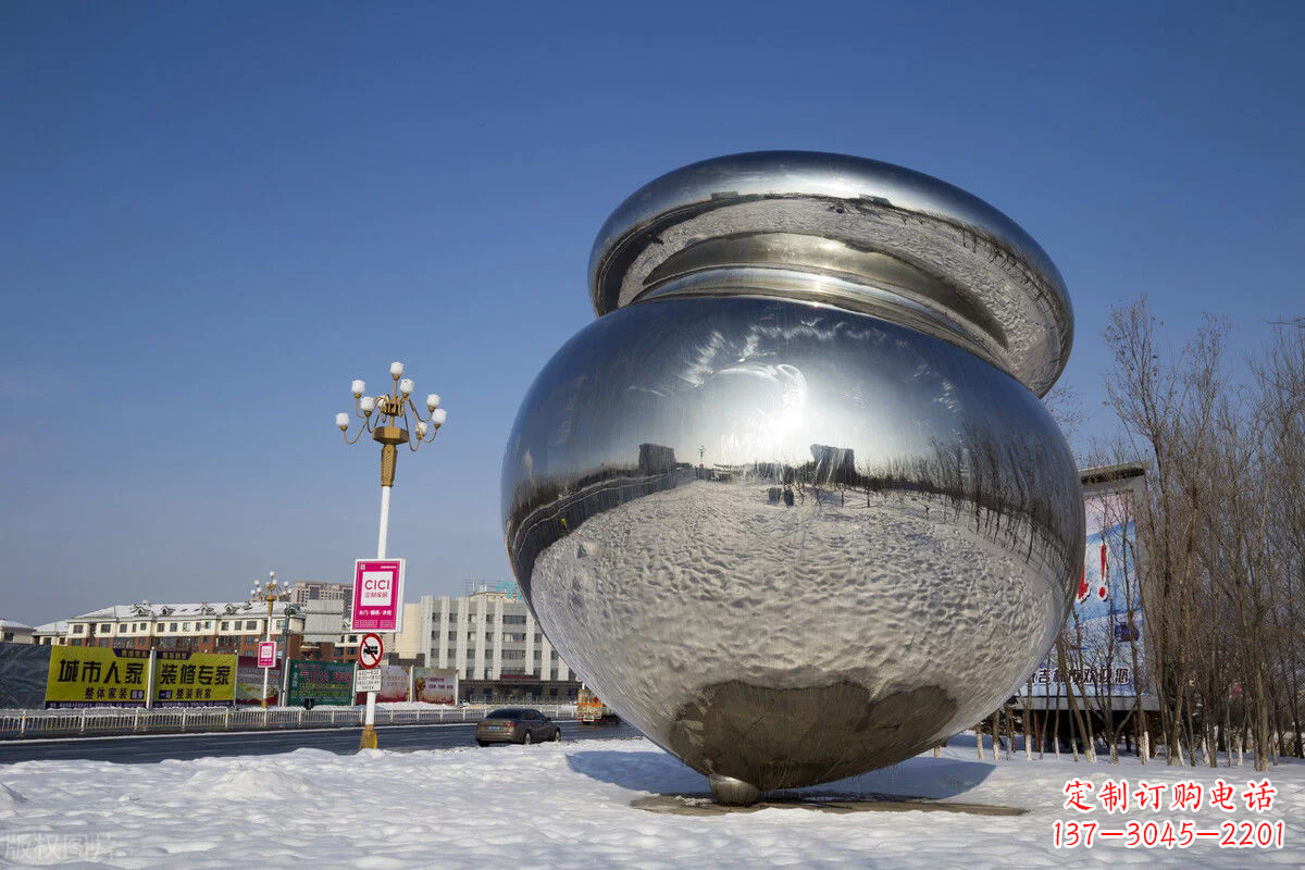 金华陀螺雕塑-户外广场大型景观不锈钢镜面陀螺雕塑